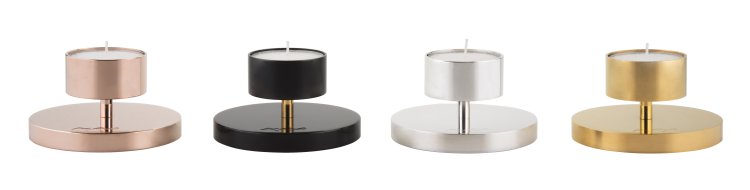 Edle, moderne Teelichthalter in rosegold, schwarz, silber und gold aufgereiht vor weissem Hintergrund.